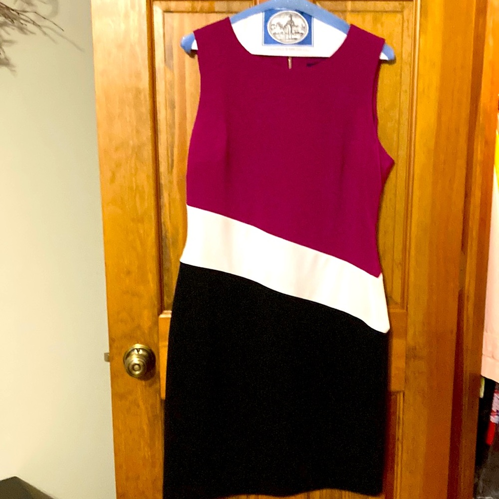 Tommy Hilfiger sheath dress with symmetrical bold stripes in front and back.